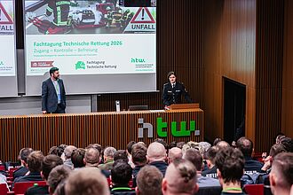 Vortragender und Publikum im Hörsaal